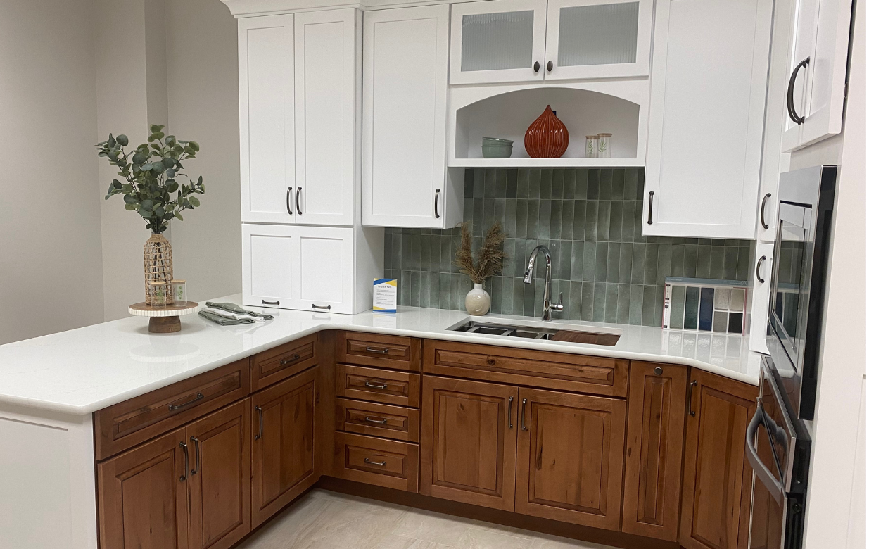 custom white countertops in a kitchen with white and natural cabinetry